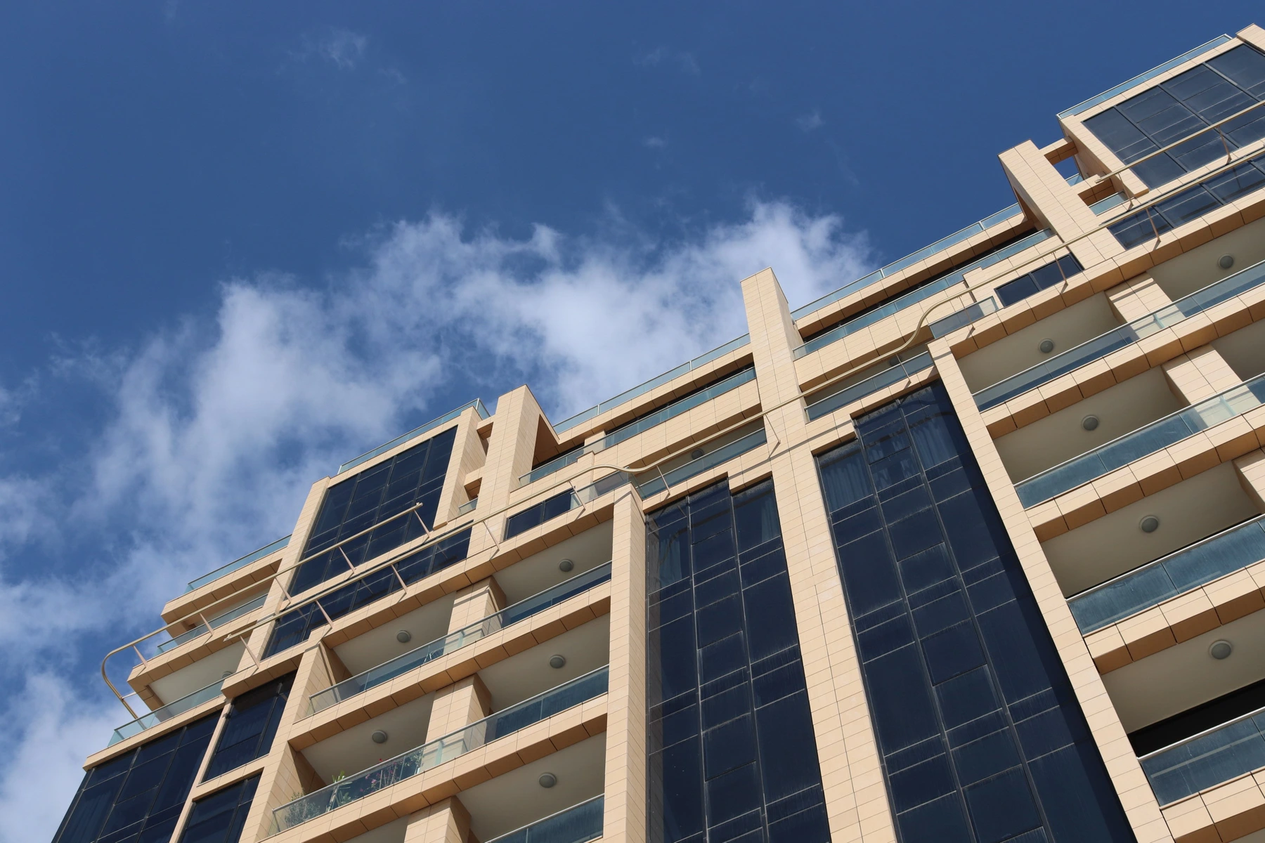 Al Qurm View building photograph published by its project architect